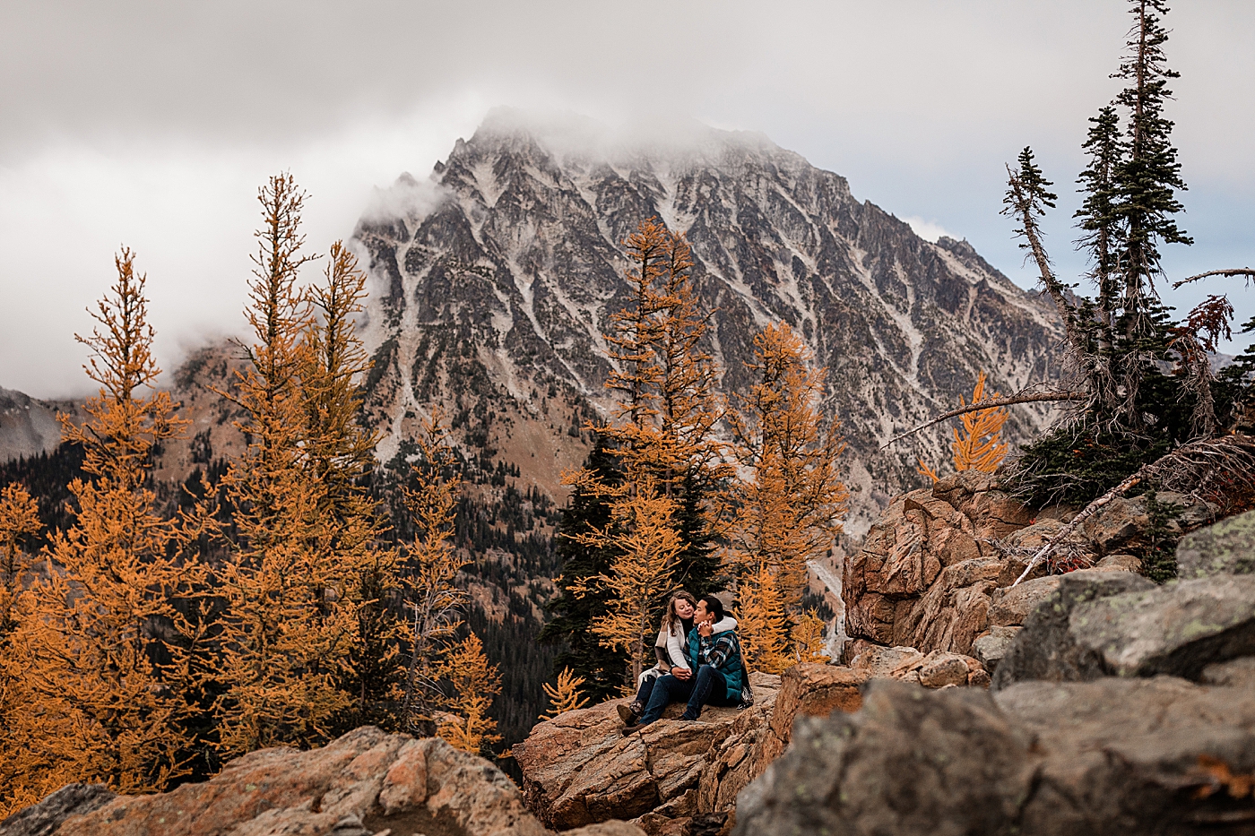 Engagement photoshoot in the larches at Lake Ingalls. Photo by Megan Montalvo Photography.