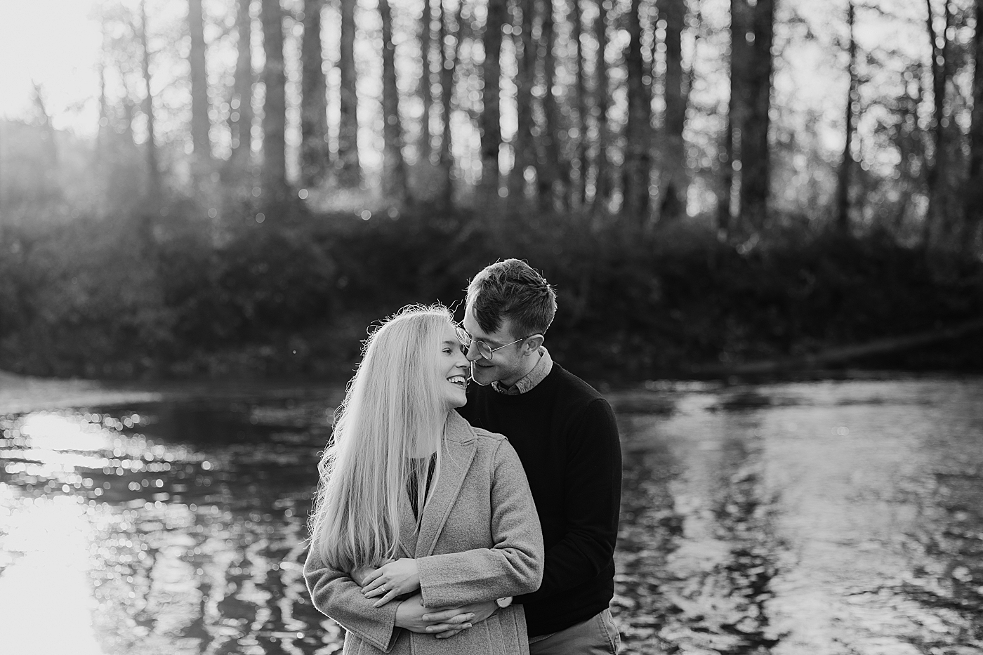 Black and white photo of engaged couple. Photo by Megan Montalvo Photography.