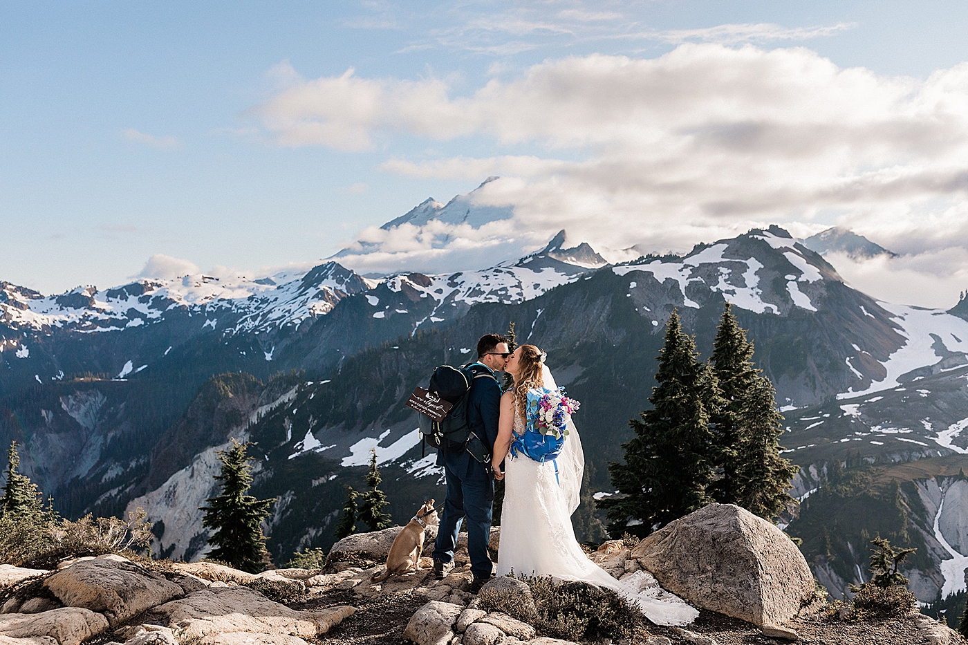 Couple kissing at the top of Artist Point. Photo by Megan Montalvo Photography.