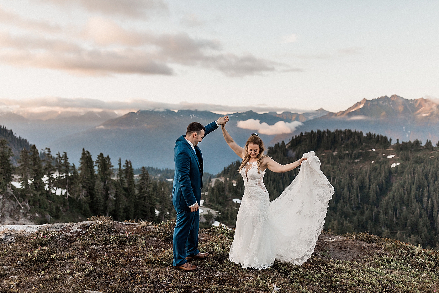 Couple dancing at the top of Artist Point with the North Cascades all around them. Photo by Megan Montalvo Photography.