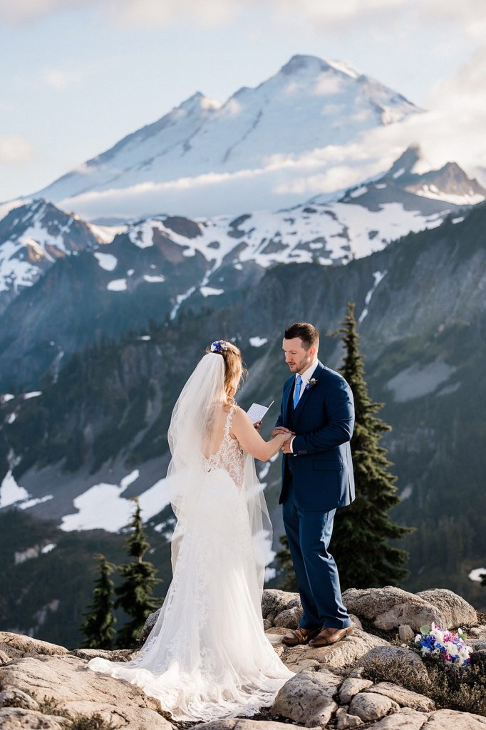 Couple eloping in the north cascades exchanging vows | Megan Montalvo Photography