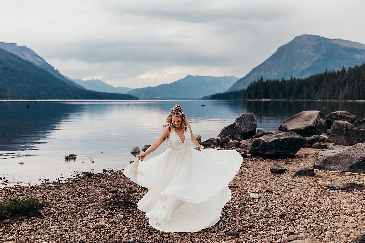 Bride dancing in beautiful BHLDN wedding gown. Photo by Megan Montalvo Photography.