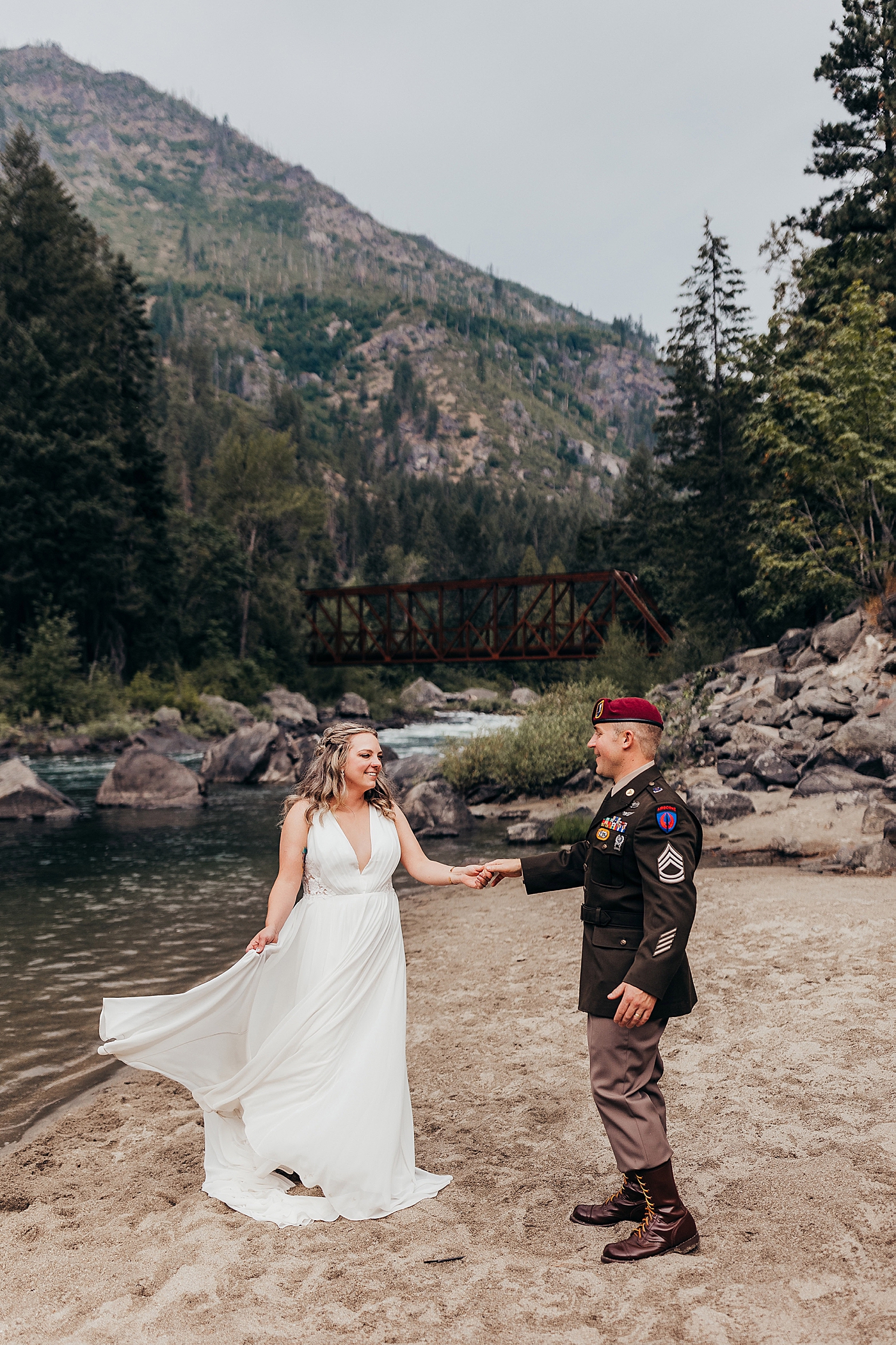 Newlyweds dancing along the water. Photo by Megan Montalvo Photography.