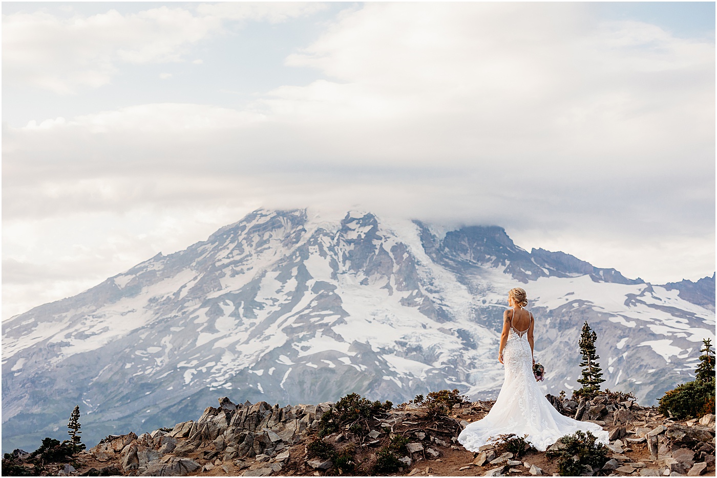 Bridal portraits with snowy Mt. Rainier in the background | Photo by Megan Montalvo Photography