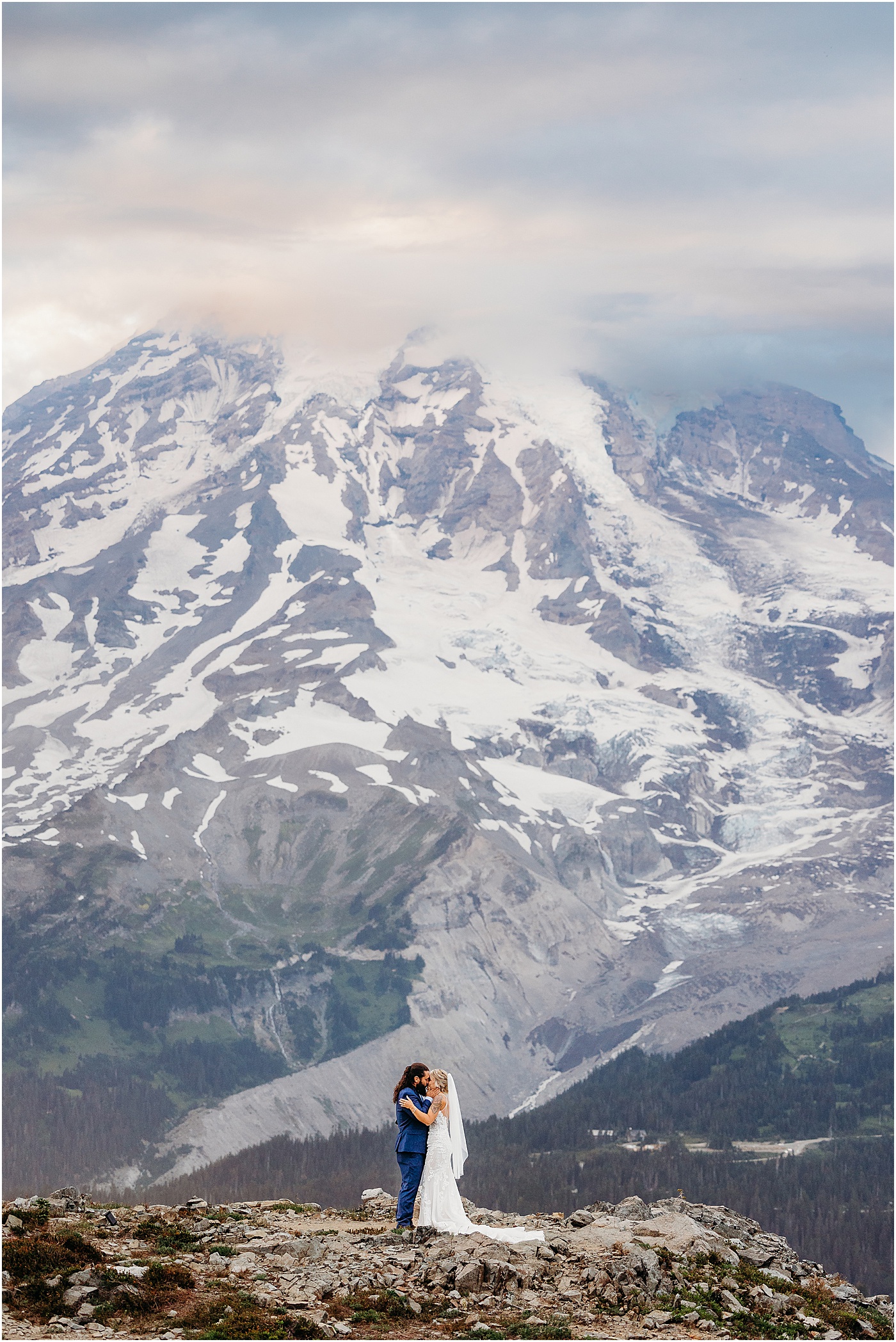 Bride and groom portraits with Snowy Mt. Rainier in the background | Photo by Megan Montalvo Photography