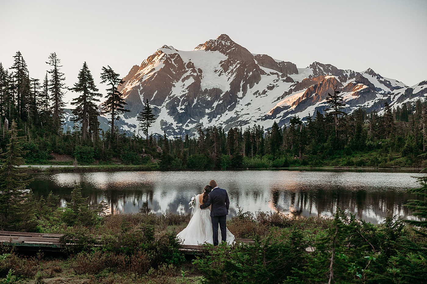 Bride and groom looking towards Mount Baker | Megan Montalvo Photography