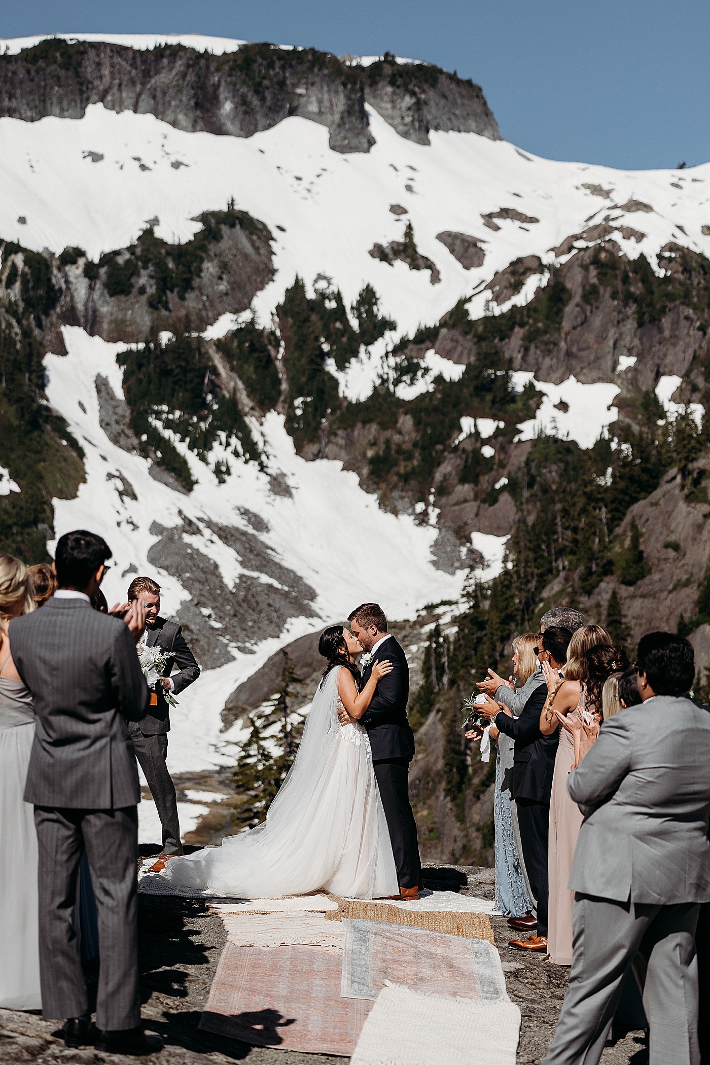 Bride and groom first kiss during intimate elopement ceremony | Megan Montalvo Photography