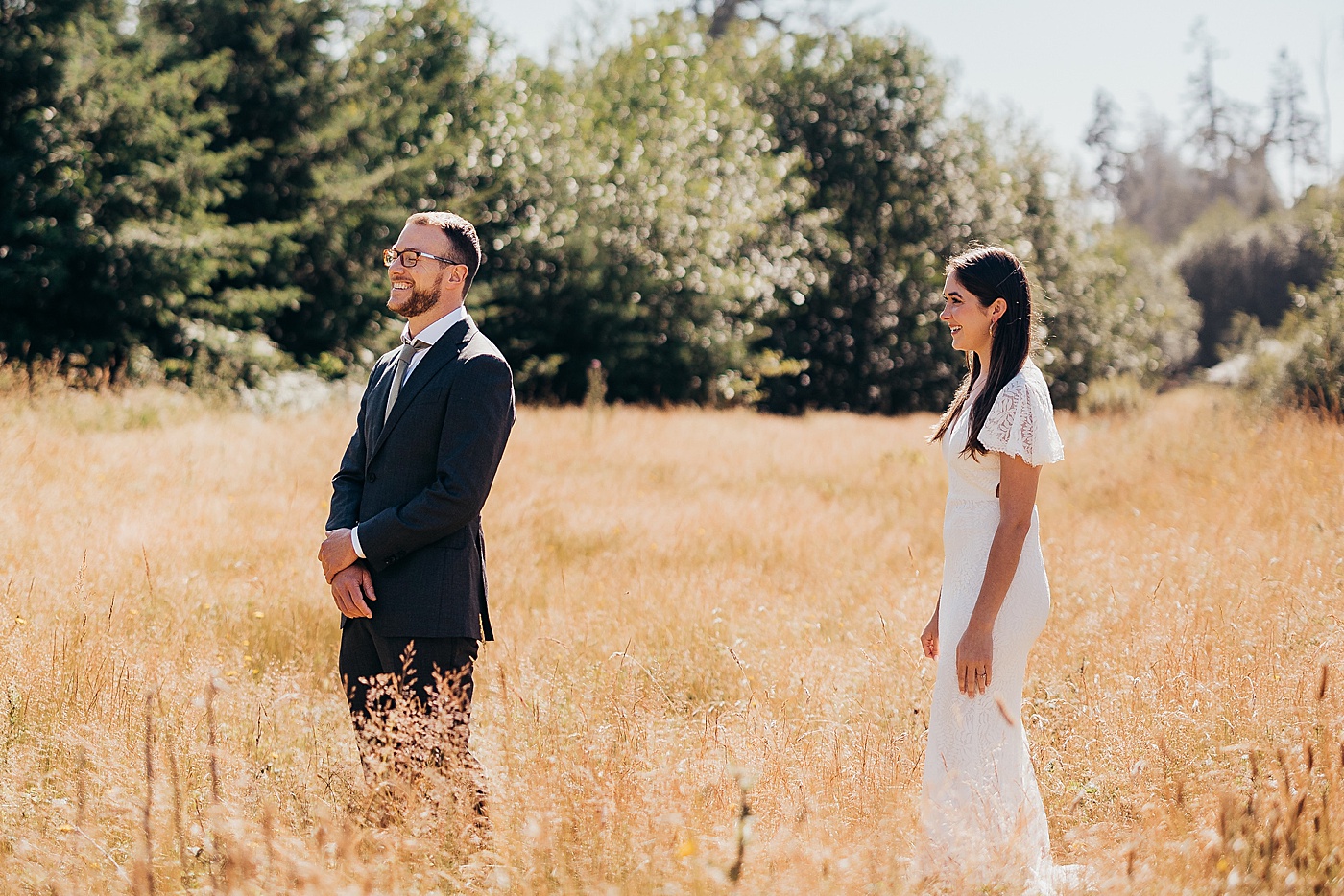 First look in field for bride and groom | Megan Montalvo Photography