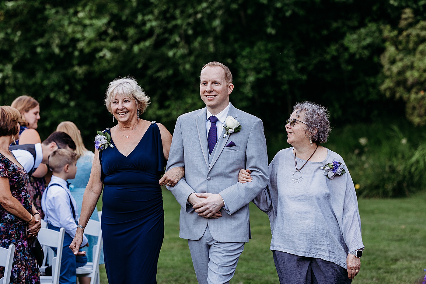 Mom walking son down the aisle at Washington state intimate wedding venue, Sanders Estate | Megan Montalvo Photography