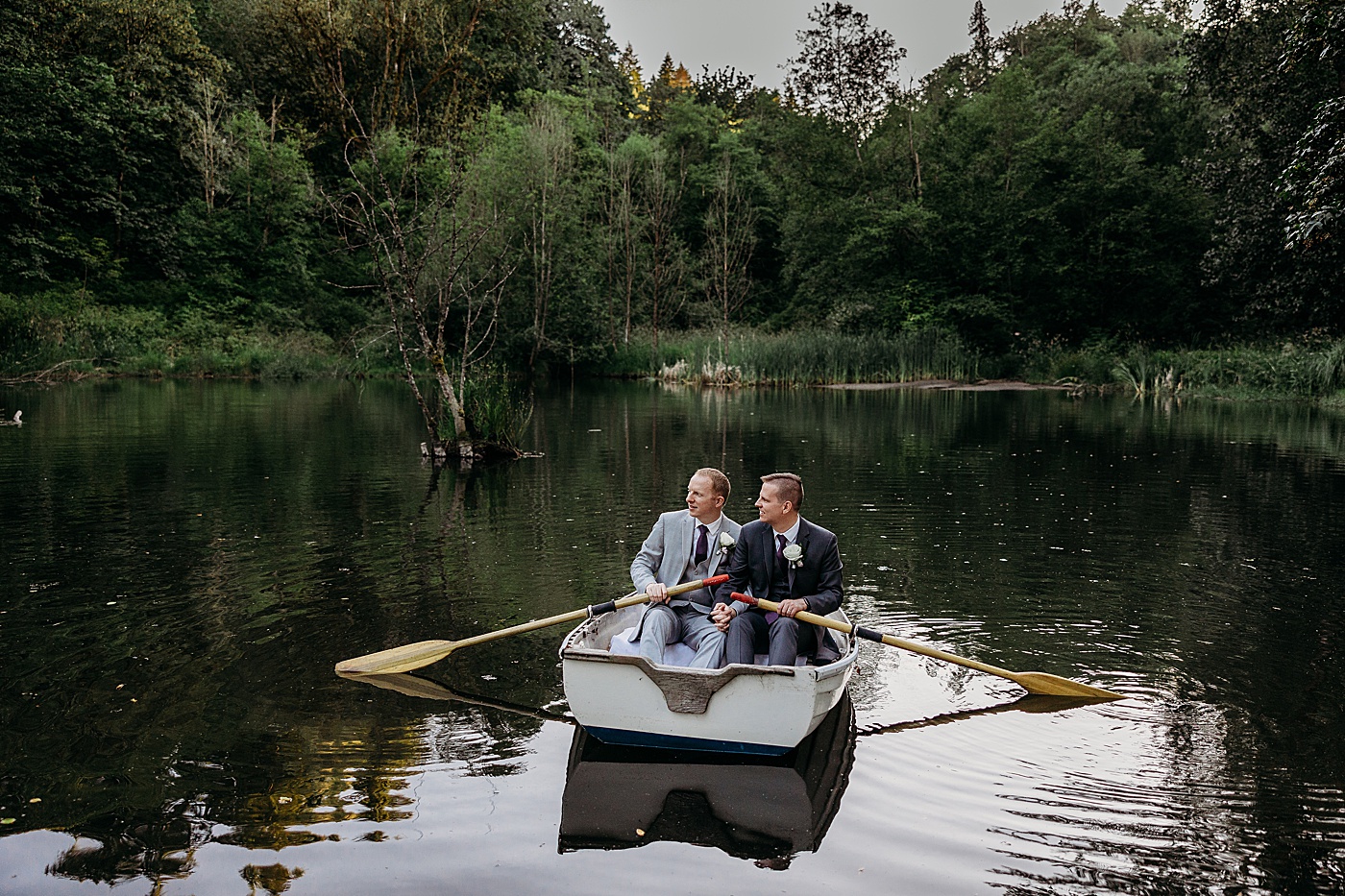 Newlywed couple in boat at Sanders Estate | Megan Montalvo Photography