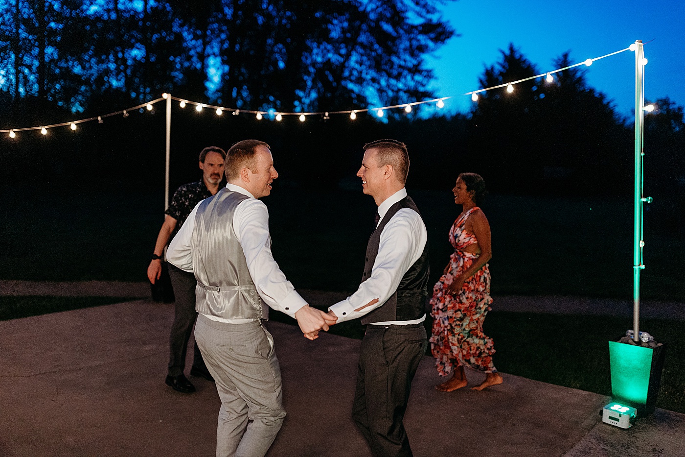 Grooms dancing during wedding reception | Megan Montalvo Photography