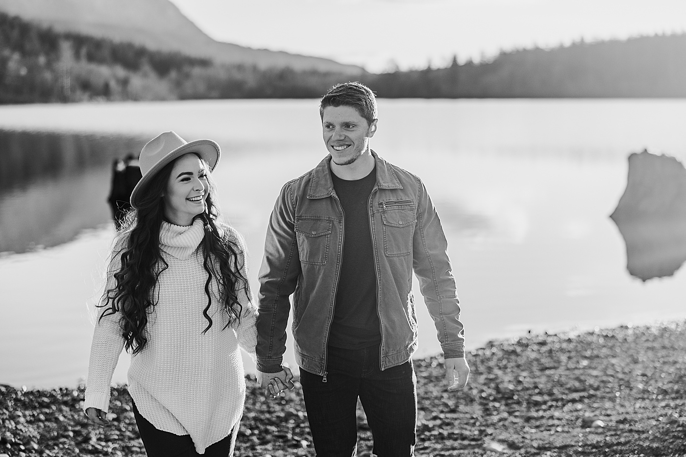 Couple laughing and walking hand in hand along Rattlesnake Lake | Megan Montalvo Photography
