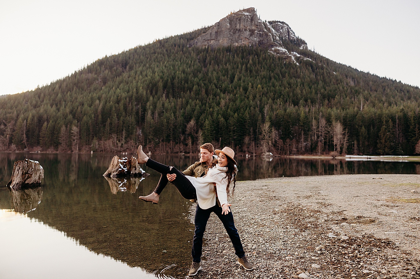 Couple playing during engagement session at Rattlesnake Lake | Megan Montalvo Photography