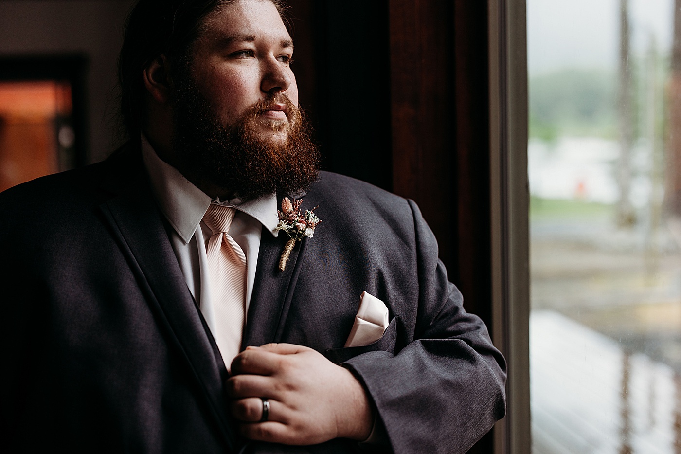 Groom getting ready for elopement ceremony | Photo by Megan Montalvo Photography