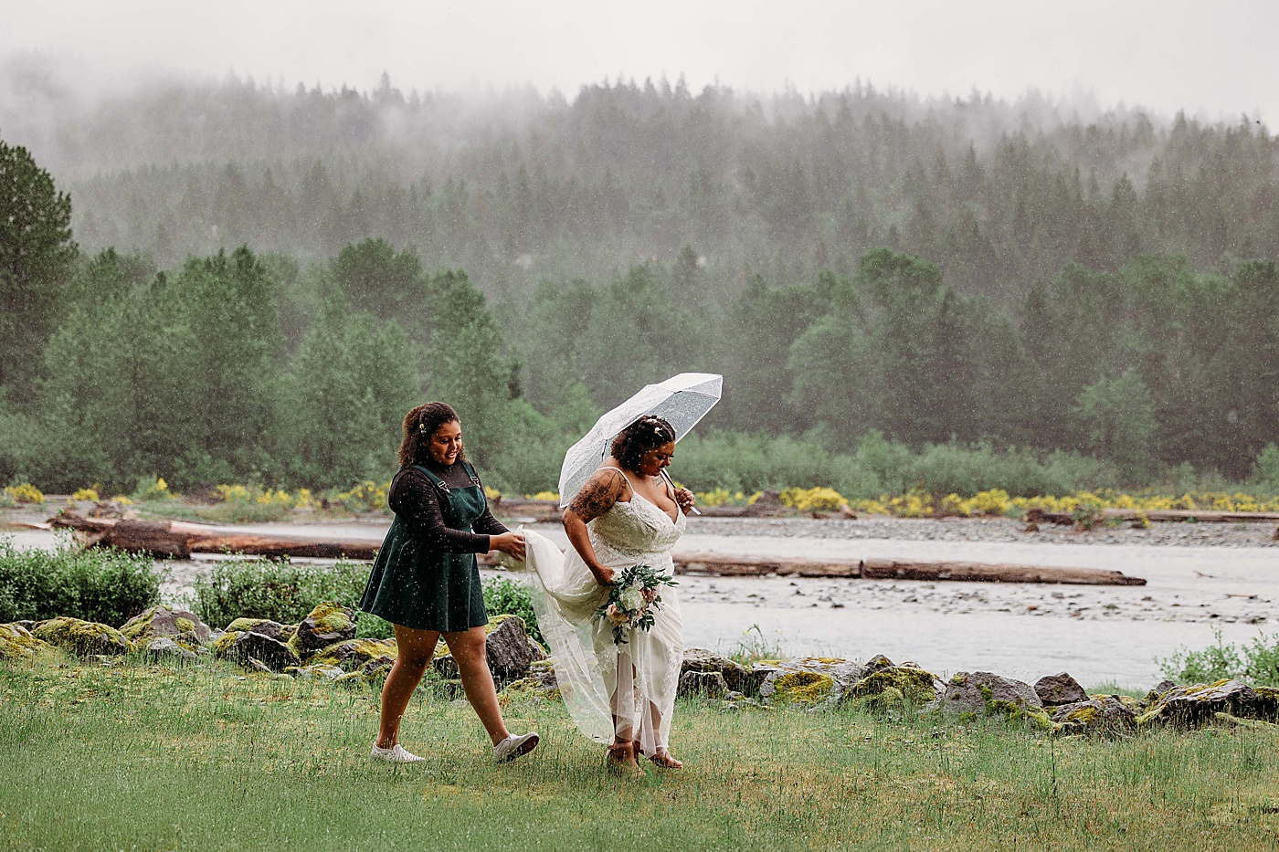 Bride walking to first look in the rain | Photo by Megan Montalvo Photography