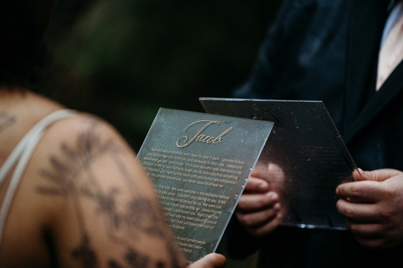 Personal vows during rainy elopement at Mount Rainier | Photo by Megan Montalvo Photography