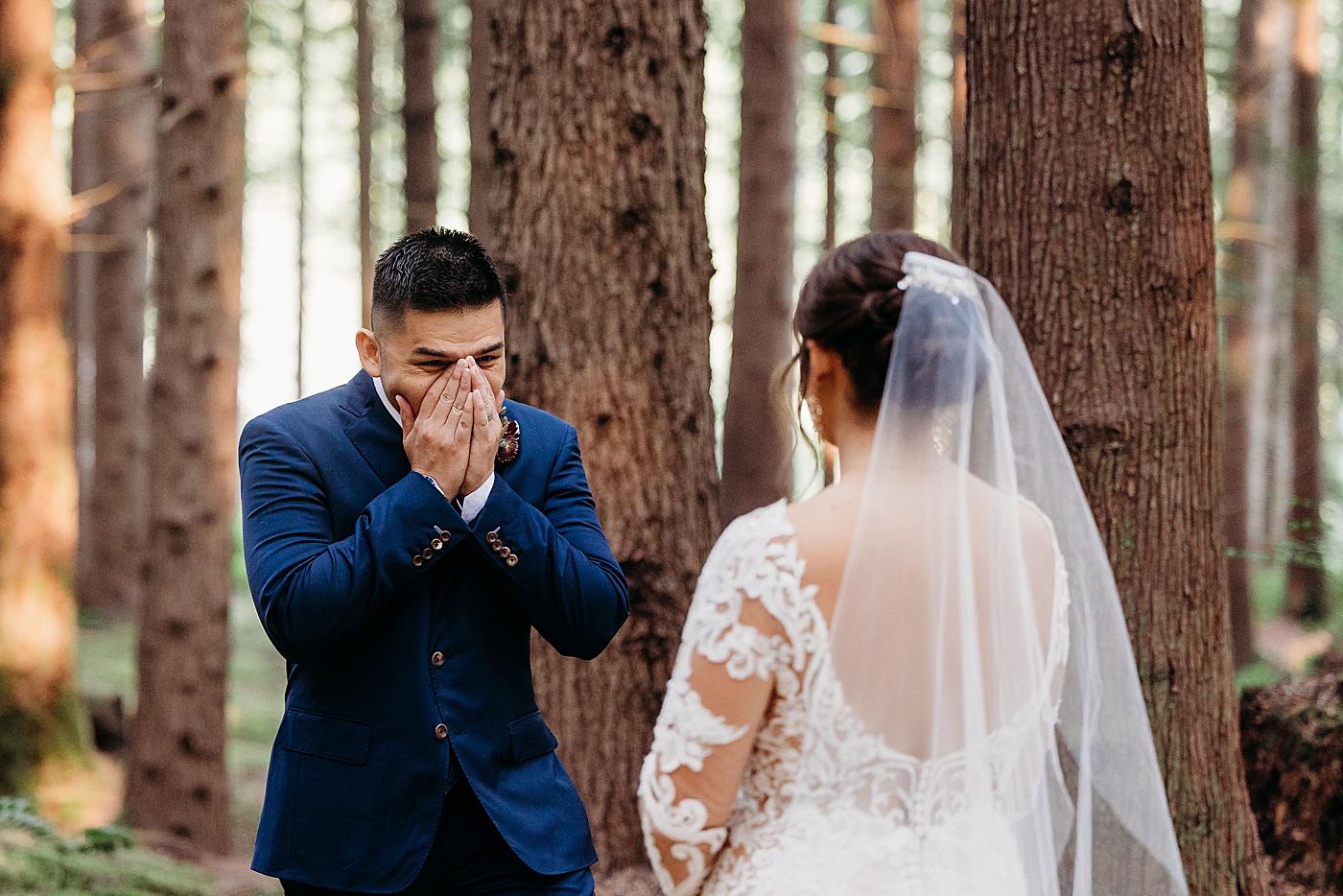 Bride and groom first look at Emerald Forest Treehouse | Photo by Megan Montalvo Photography