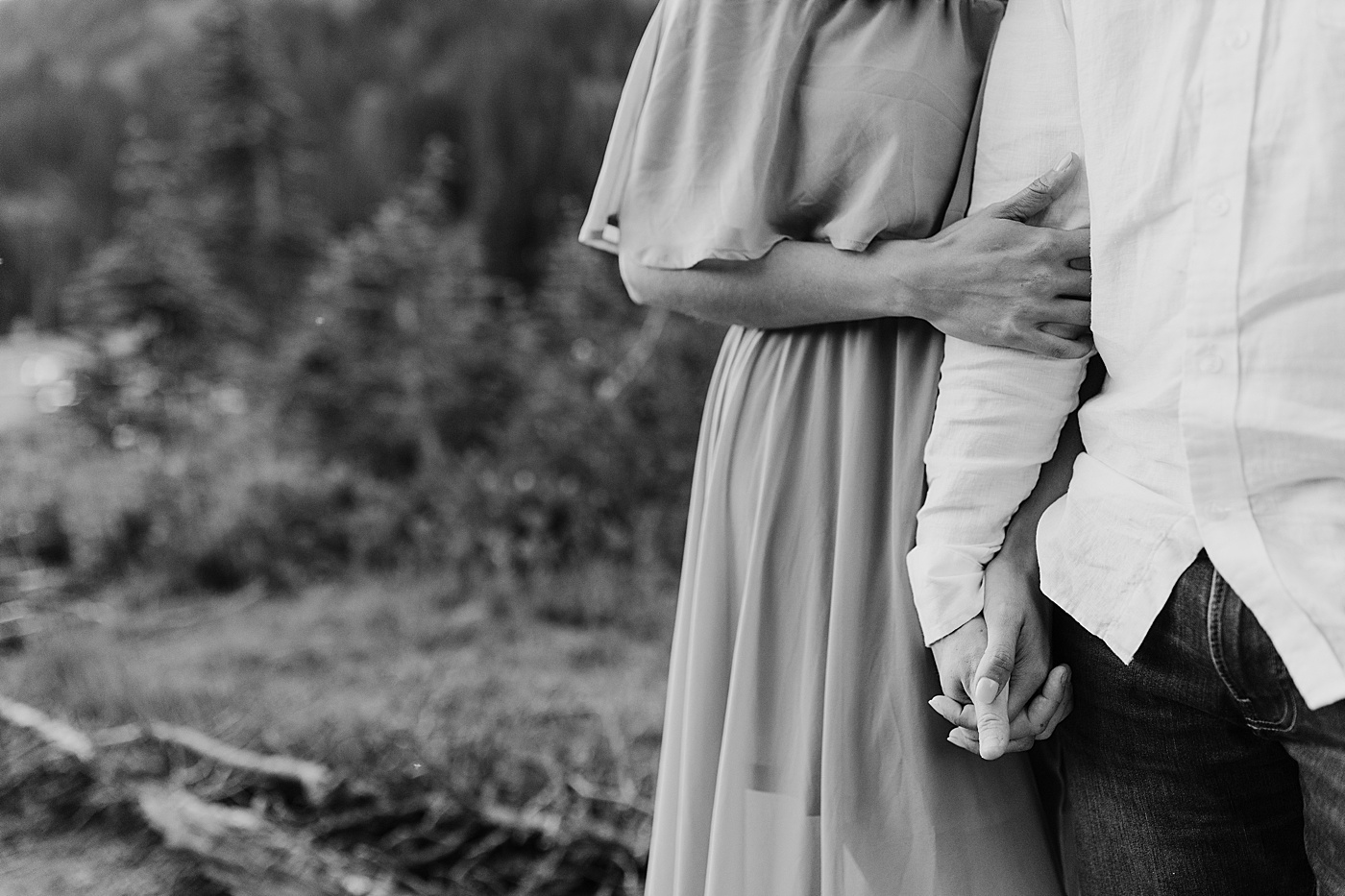 Engaged couple holding hands | Photo by Megan Montalvo Photography