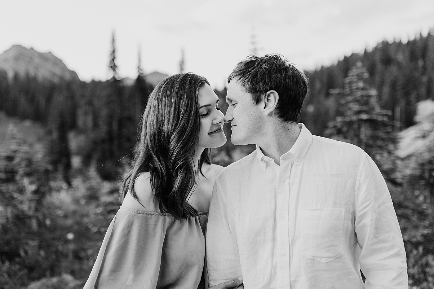 Couple nose-to-nose during engagement session | Photo by Megan Montalvo Photography