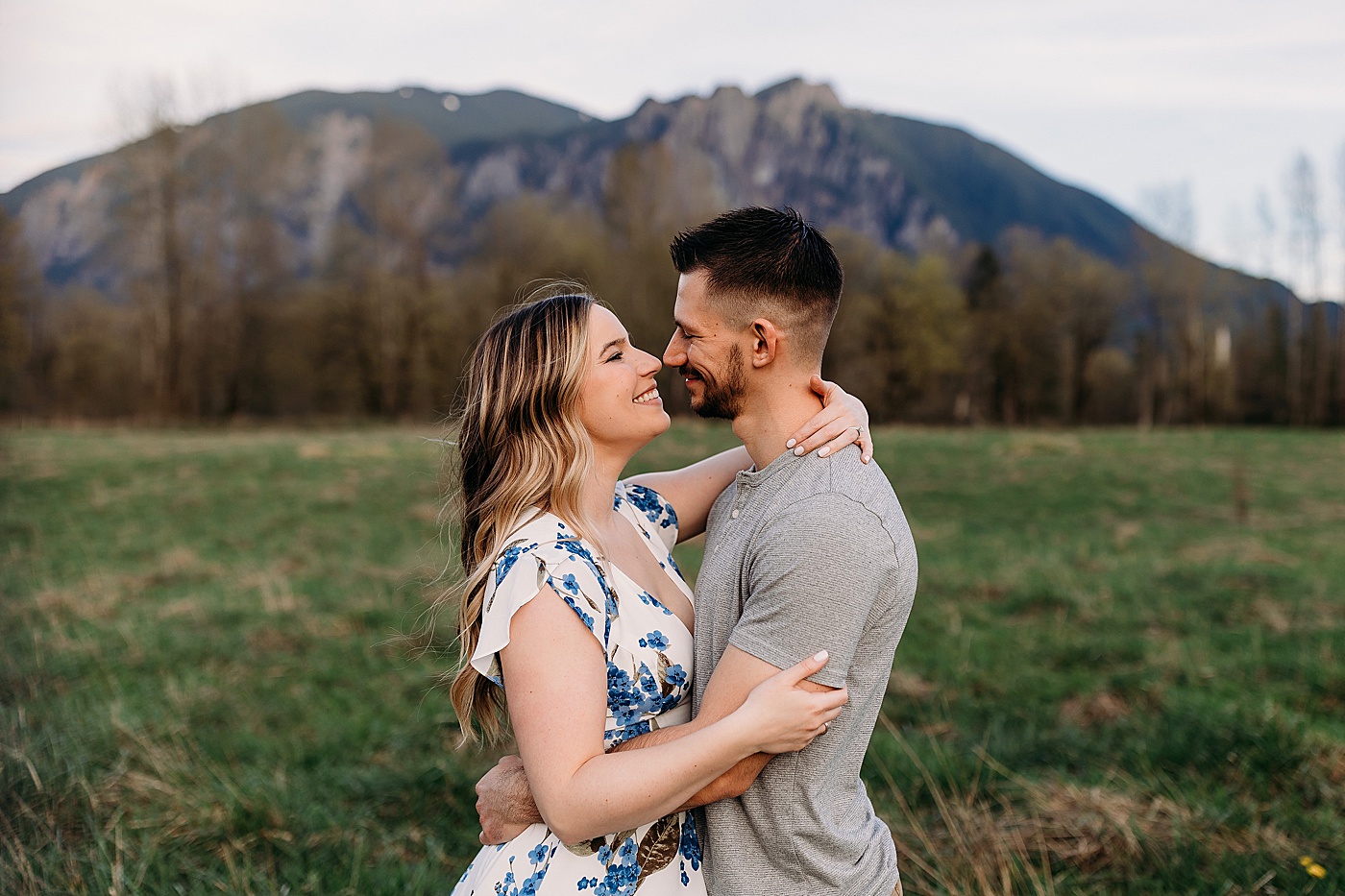Couple nose to nose during engagement photos | Photo by Megan Montalvo Photography
