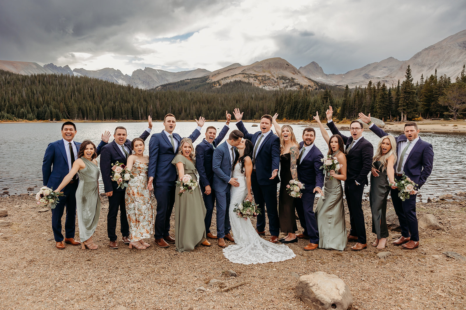 wedding bridal party in front of a lake