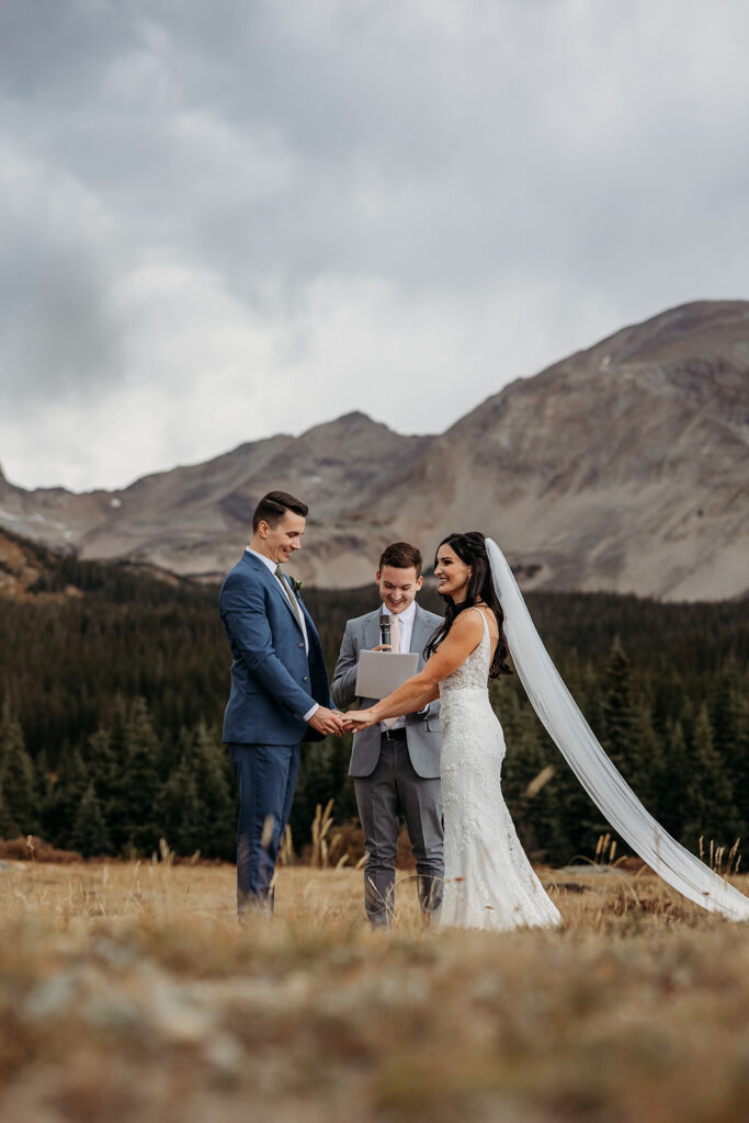 bride and groom at elopement ceremony in colorado nature