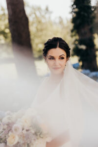 bride with veil over her face