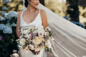 bride holds flowers