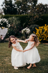 little girls dance together