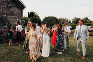 wedding guests dancing together